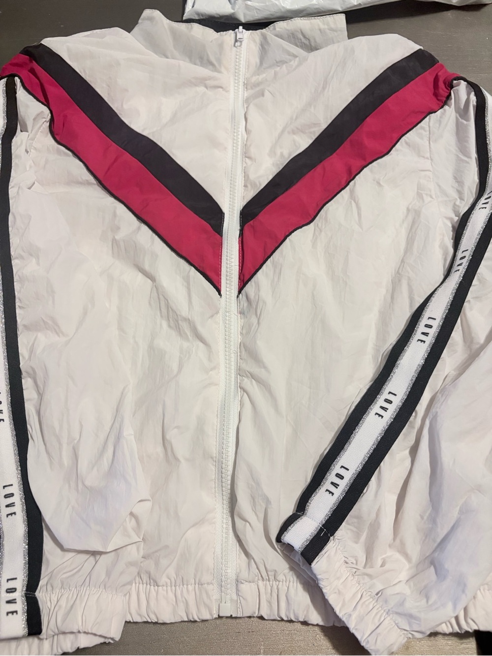 Women's White Bomber Jacket with Pink & Black Chevron Detail